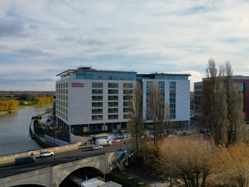 The nearly built Hilton Garden Inn on the banks of the River Nene at Fletton Quays, Peterborough