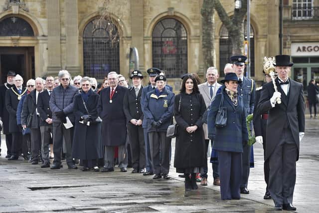 Holocaust Memorial Day in Peterborough. The Deputy Mayor's attendant leads a procession of dignitaries from the Town Hall to St John’s Church for the commemoration.