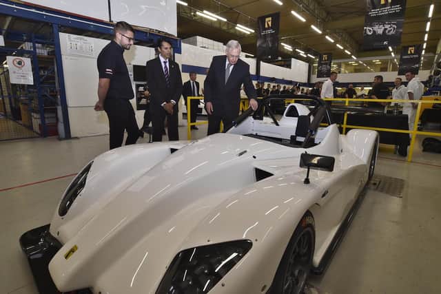 The Duke of Gloucester inspects one of the racing cars built by Radical Motorsport during a visit to the manufacturer in 2019.