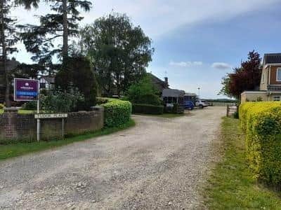 Existing access road off London Road to Tudor Place and Folly Farm stables, in Yaxley