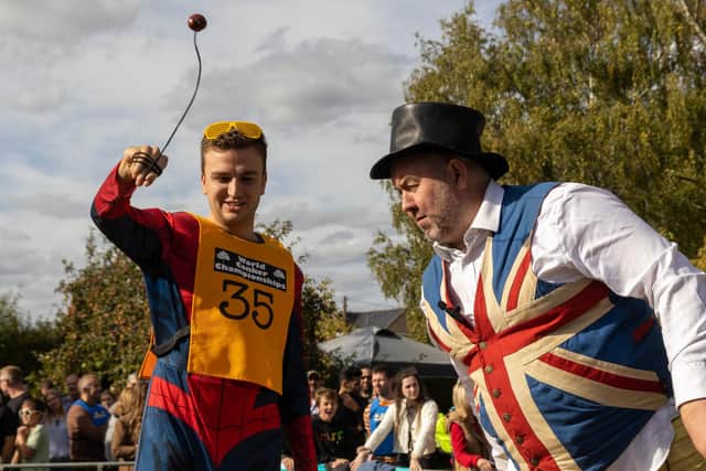 A 'fun, family friendly, fete-like atmosphere' - Spiderman does battle with John Bull (image: Iain Evans)