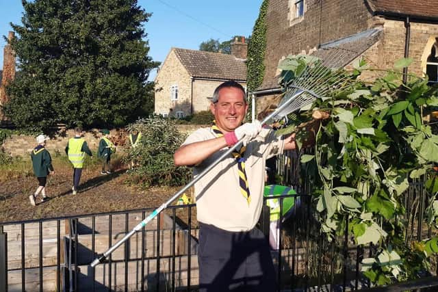 Thorney Scout Leader Stuart Cole was just as keen to get involved as the cubs, scouts and beavers who volunteered to help clear Thorney and Eye Foodbank's overgrown garden.