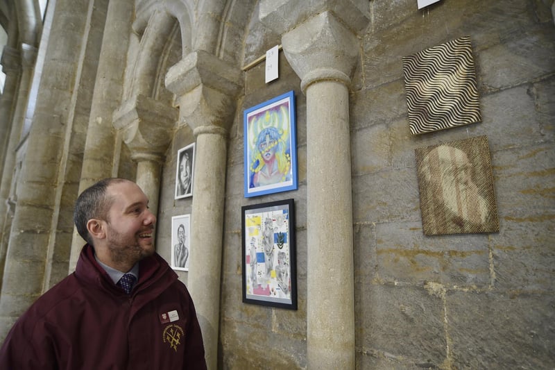  Made in Peterborough art exhibition at Peterborough Cathedral. Cathedral welcomer Sefton Thornton-Lewis with his wood burning art