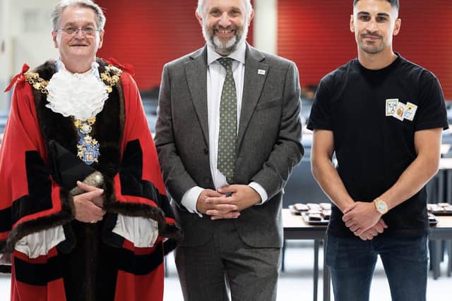 Jordan Gill, right, with Principal Richard Scott and Wisbech Mayor Peter Human