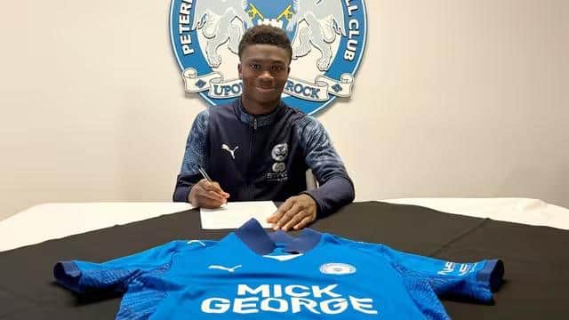 Bolu Shofowoke signs his first professional contract at Posh. Photo Joe Dent/theposh.com