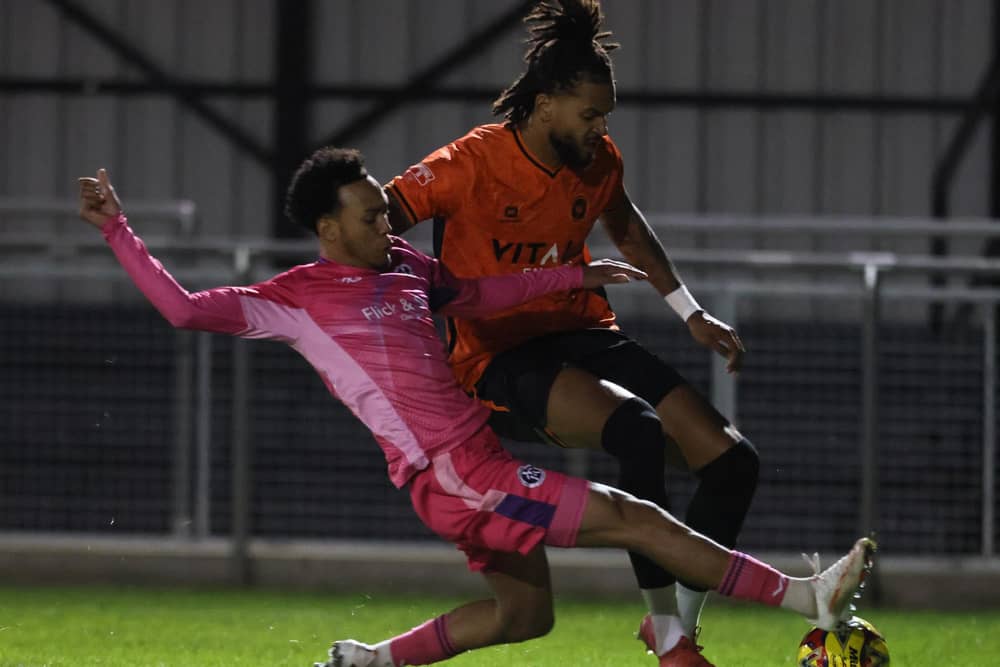 Action from Peterborough Sports (orange) v Leiston. Photo Darren Wiles.