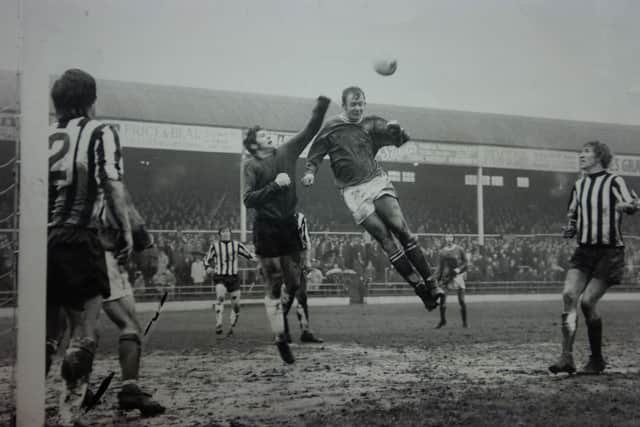 A towering header from Posh record goalscorer Jim Hall.