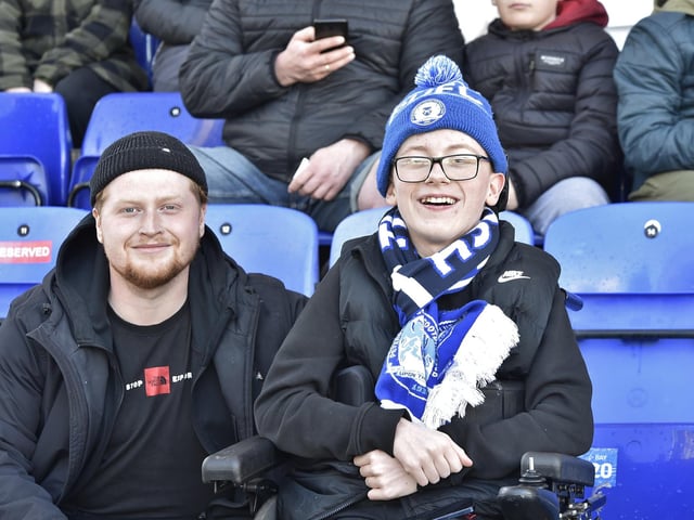 Peterborough United fans are pictured enjoying another home win.