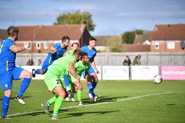 Ryan Fryatt heads in for Peterborough Sports against Hemel Hempstead in their last match.