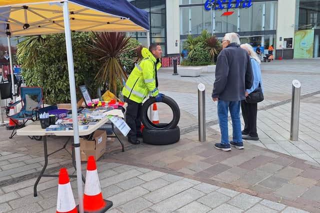 PC Adrian Boddington talks to a couple at one of the pop-up events.
