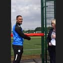 Jonson Clarke-Harris cuts the ribbon on the new 3G pitch at St John Fisher Catholic school.