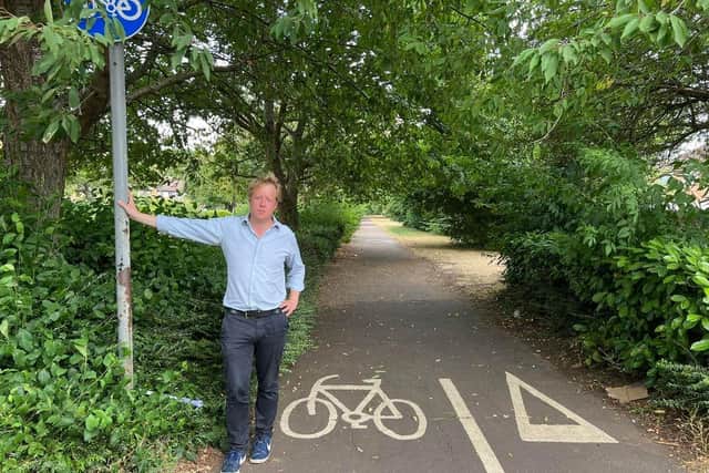 MP Paul Bristow has called for barriers to be put on the path to slow cyclists down