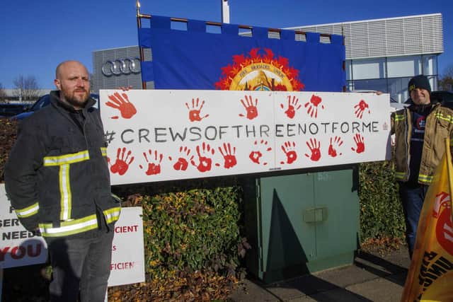 Fire Brigades Union protesters in Huntingdon. Photo: Mark Thomas.