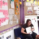 Cllr Katy Cole reading to children at Newark Hill Academy