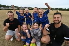 Under 9s ICA girls footballers Natalia, Poppy, Mila, Violet, Felicity and Caydence with coaches Jamie Murrell and Taylor Hunter
