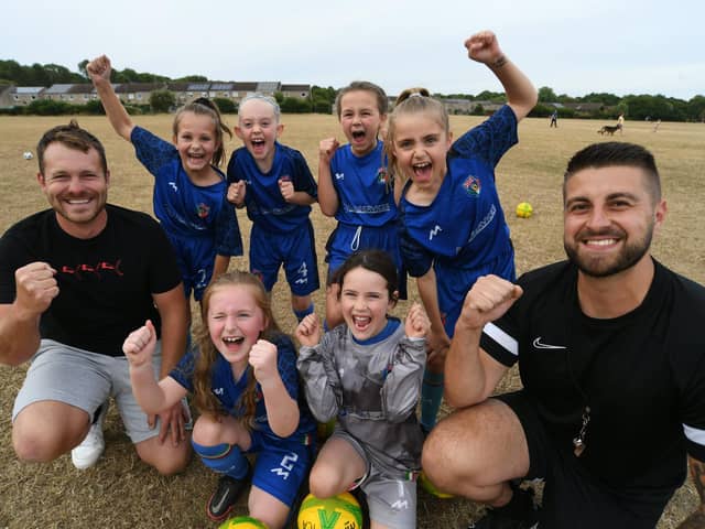 Under 9s ICA girls footballers Natalia, Poppy, Mila, Violet, Felicity and Caydence with coaches Jamie Murrell and Taylor Hunter