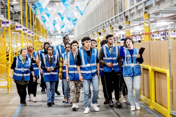 Students from the Inspire Education Group enjoy a tour of the Amazon fulfilment centre in Peterborough