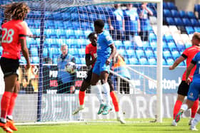 Kwame Poku scores the opening goal for Peterborough United. Photo: Joe Dent.