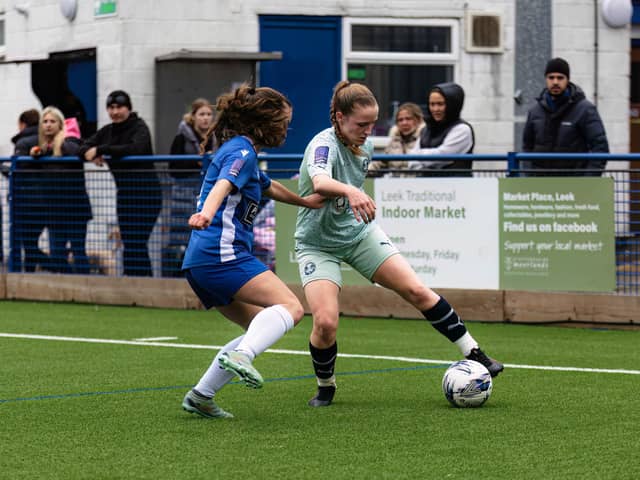 Evie Driscoll-King (right) in action for Posh Women at Leek Town. Photo: Ruby Red Photography