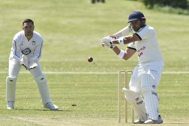 Werrington batsman Mohammed Bilal goes on the attack in his side's Hunts League Division One match with Hampton (Picture: David Lowndes).