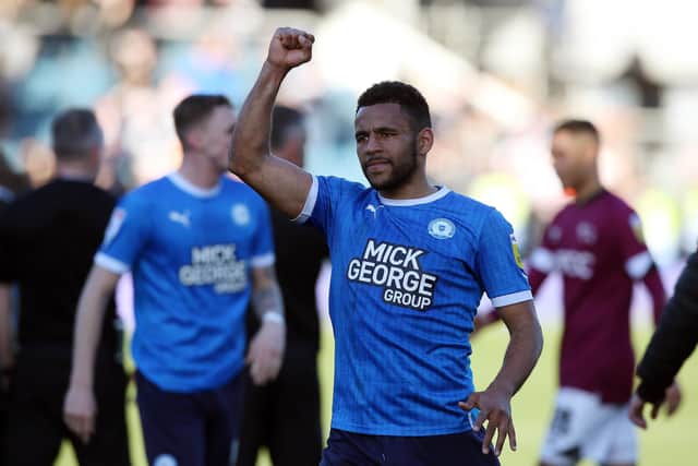 Nathan Thompson of Peterborough United celebrates the win over Derby at full-time. Photo: Joe Dent/theposh.com.