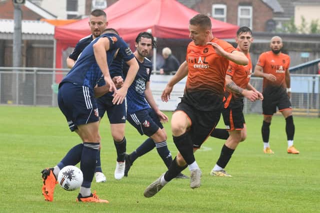 Action from Peterborough Sports (orange) v Scarborough Athletic. Photo: David Lowndes.