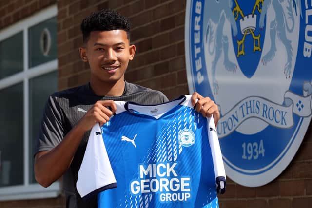 Kobe Chong after signing for Posh.