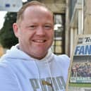Mark Tracy, better known as Ginge, with the 1992 front page where he appeared with the Posh team.