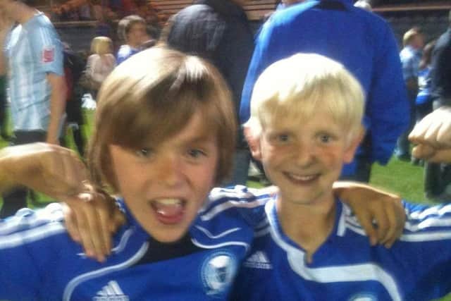 Harrison was a Posh fan before playing for the first team - here he is with friend and Wisbech St Mary team mate William Pentelow