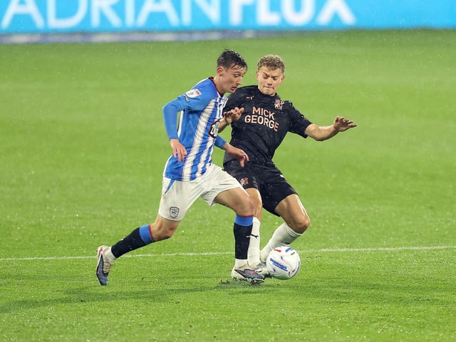 The teenager has raced ahead of every other centre-back in the Posh pecking order. The middle of the back three could suit him, although it might also be the safest place for Hughes.