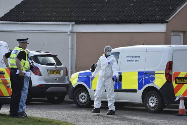Police at the scene of the shooting in Crabtree. Officers have launched a new appeal for information