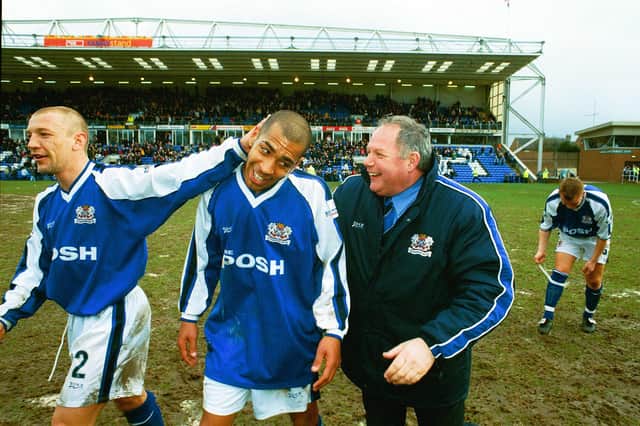 Posh celebrate after beating Cambridge at London Road in 2001, from the left, Dean Hooper, Francis Green and manager Barry Fry. Photo: Paul Franks.