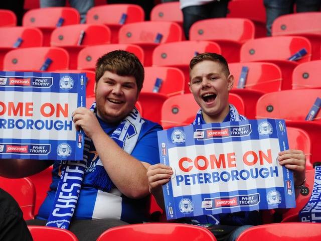 Peterborough United fans soak in the Wembley atmosphere in 2014.