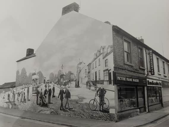 The mural in New Road, Peterborough, in 1982, painted by  Francis Gomila.