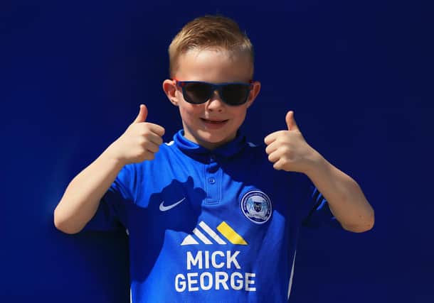 A young Peterborough United fan shows his support for Posh prior to the Sky Bet League One match against Blackpool in 2016.