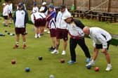 The bowlers of Hunts and Northants studying an end in the MIddleton Cup match at Parkway. Photo David Lowndes.
