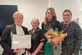 Volunteer Jet Watts receives a posthumous Outstanding Achievement Award in honour of her late husband Paul, with Rapid Responder Helen Gillies, daughter Clare Watts and Chief Nurse Jo Bennis.