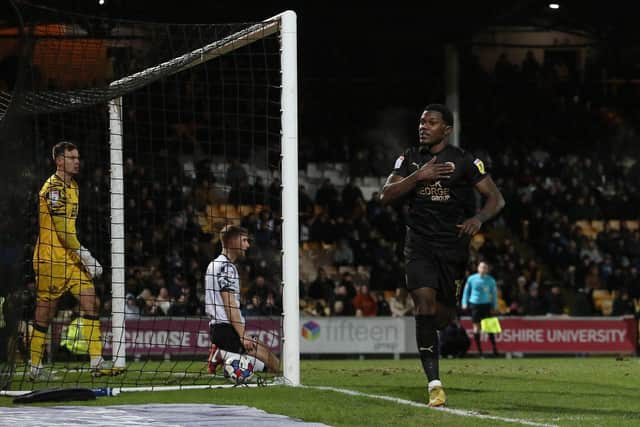 Ephron Mason-Clark celebrates scoring the opening goal against Port Vale. Photo: Joe Dent.