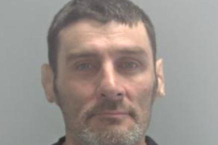Wayne McKie (44) , broke a window to a jewellery and accessories shop, in Westgate Arcade, Queensgate, Peterborough, in the early hours of 12 October. McKie, of no fixed address, was sentenced to 18 months in prison, having pleaded guilty to common assault and theft.