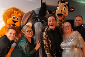 Along with the newly unveiled mascots, North West Anglia Hospitals’ Charity patron – and Strictly Come Dancing judge – Craig Revel Horwood with (left to right) charity ball compere and Head of Education at North West Anglian NHS Foundation Trust, Scott Topping; event organisers and North West Anglia NHS Foundation Trust Assistant Chief Nurses Laura Stent and Theresa McCarthy and Philip Fearn, Charity Project Manager for North West Anglia Hospitals’ Charity.