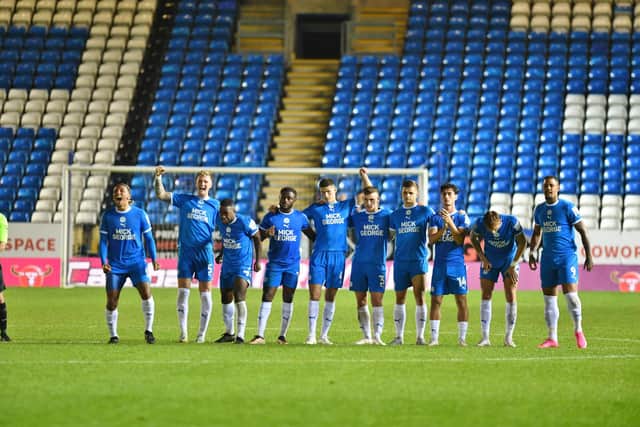 Peterborough United's players go through the emotions during their penalty shootout victory. Photo: David Lowndes.