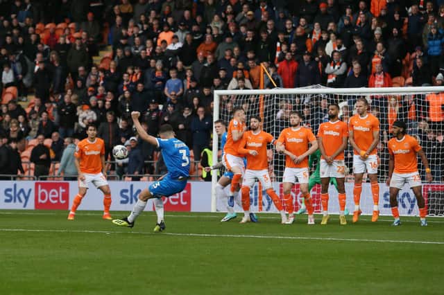 Harrison Burrows of Peterborough United scores direct from a free-kick making it 2-0. Photo: Joe Dent.