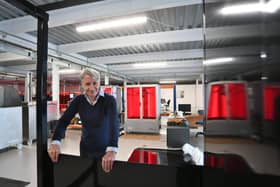 Photocentric founder Paul Holt with the frame for the largest 3D printing system at the company's new premises in Titan Drive, Fengate.