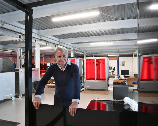 Photocentric founder Paul Holt with the frame for the largest 3D printing system at the company's new premises in Titan Drive, Fengate.