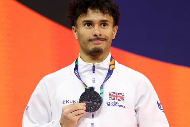 Jake Jarman with his silver medal from the Floor event at the World Championships. Photo by Adam Pretty/Getty Images.