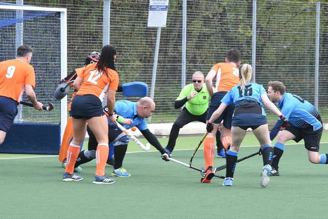 Action from Jurassic Beavers v Bourne Deeping (blue) at the Brummitt Mixed Hockey tournament. Photo: David Lowndes.