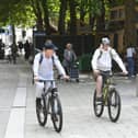 12 cyclists and a number of e-scooter riders were caught on camera breaching the rules in 45 minutes yesterday