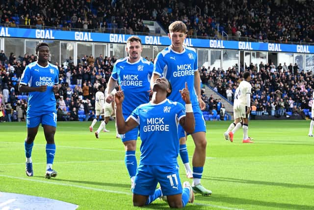 Owura Edwards celebrates his goal for Posh against Burton Albion. Photo David Lowndes.