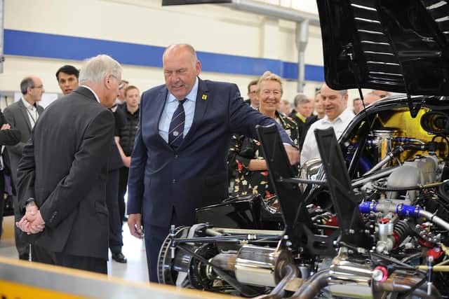The Duke of Gloucester, left, talks to Radical Motorsport's chief executive Joe Anwyll during a visit to the manufacturer in 2019.