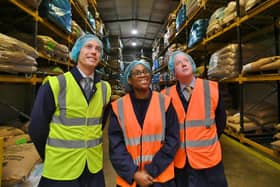 Secretary of State for Business and Trade Kemi Badenoch visiting the Masteroast coffee company at Fengate with commercial director Matthew Mills, left, and Peterborough MP Paul Bristow, right.